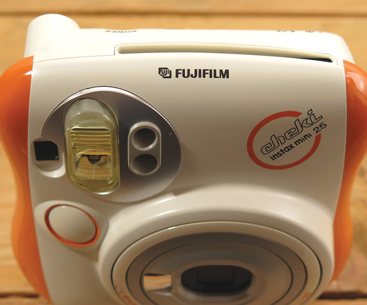 10201 | instax mini 25 cheki  orange / white (01)