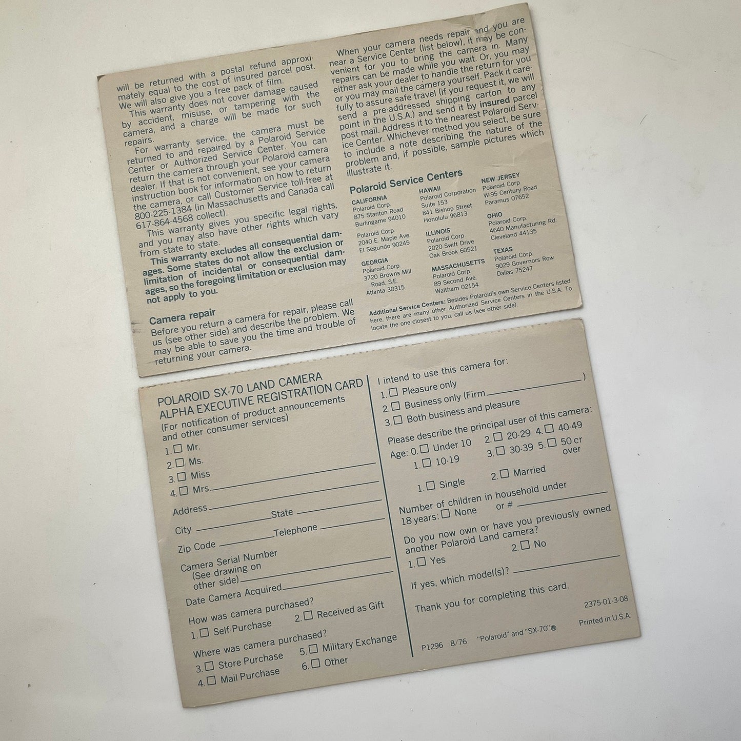 40111 | SX-70 alpha executive reg card | P1296 8/76