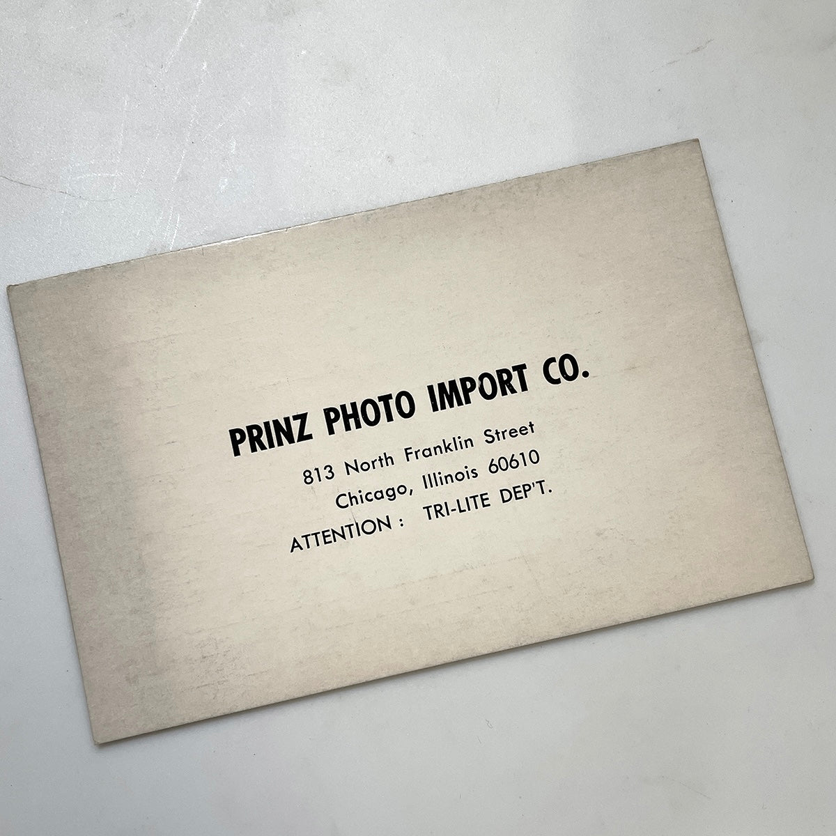 40111 | SX-70_z flash prinz tri-lite reg card