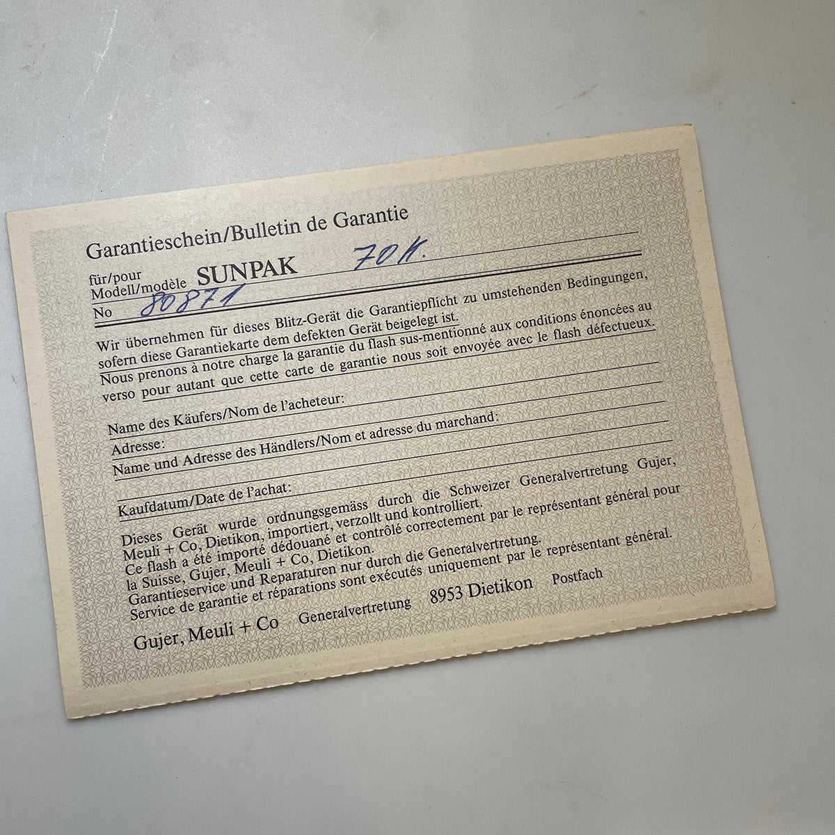 40111 | SX-70_z flash sunpak 70K reg card german