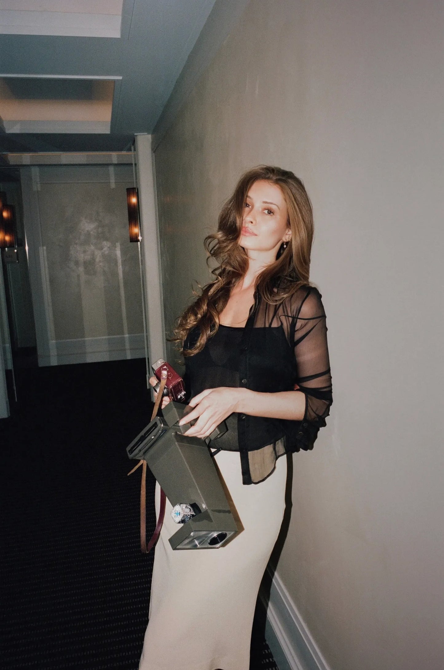 article | How Emma Beiles Howie Became the Go-To Photographer to Get the Pre-Party Outfit Shot - VOGUE